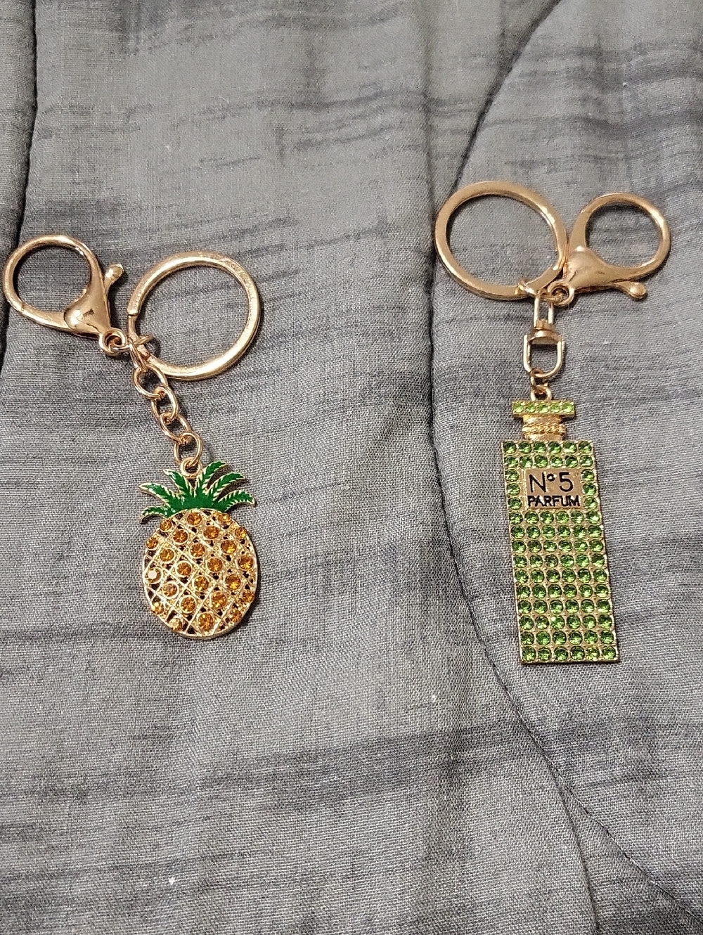2 Pc.Gold Pineapple and Green Perfume Bottle Keychain Set
